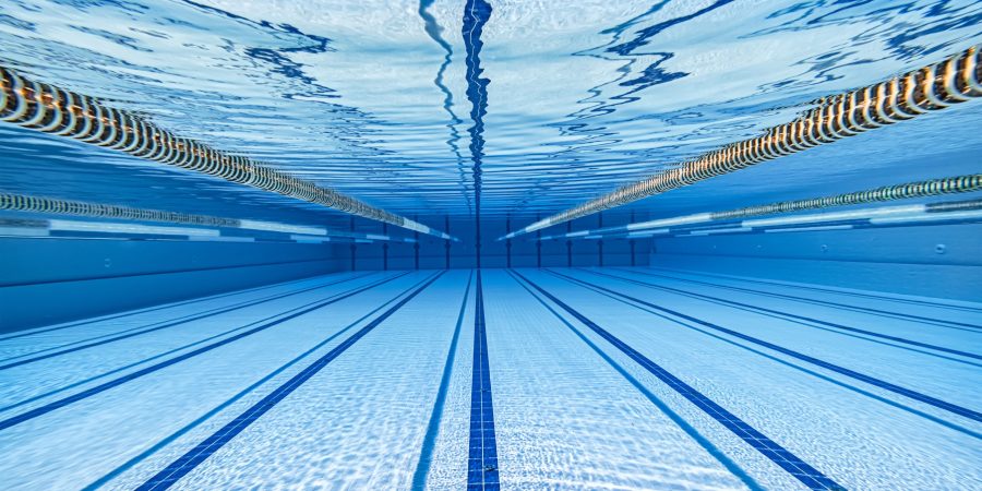 Olympic Swimming pool underwater background.
