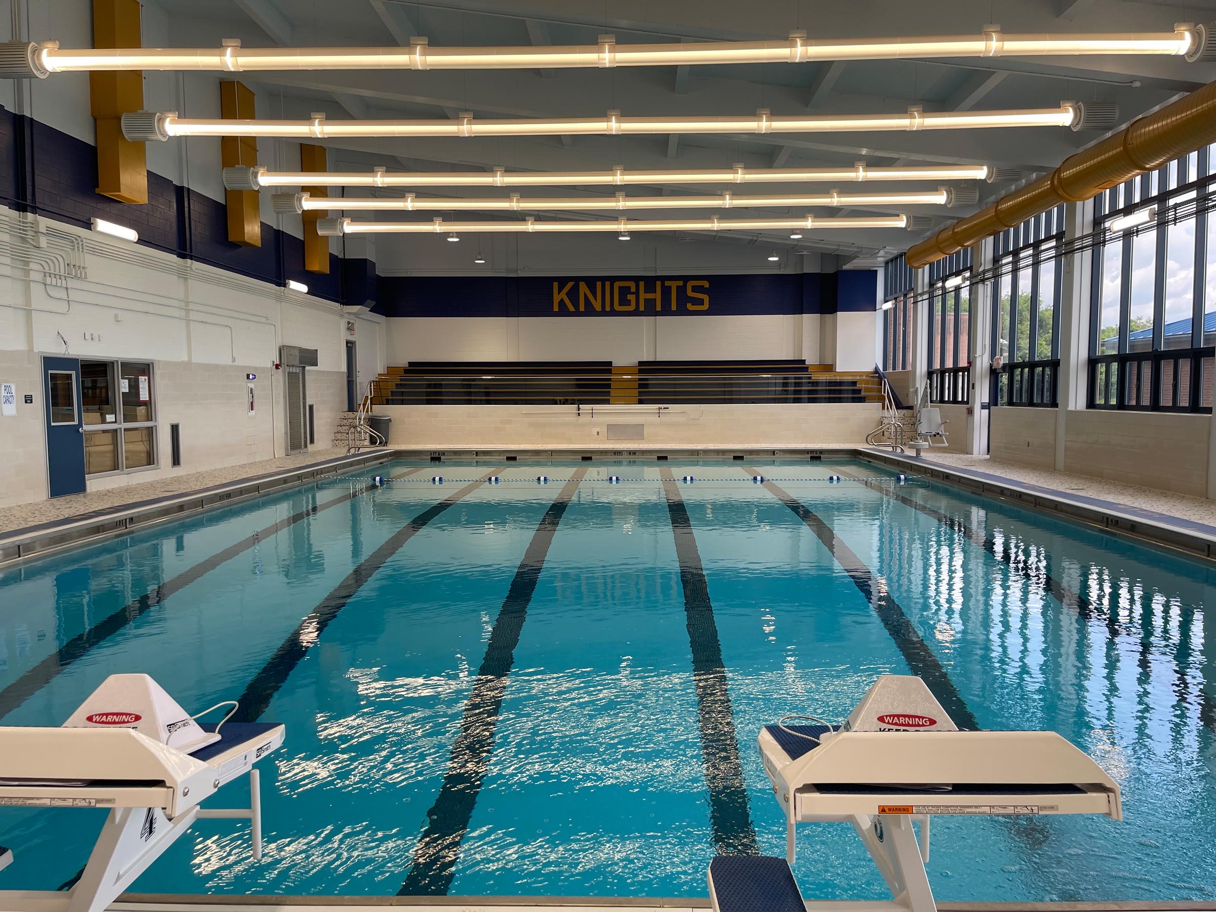 AFTER Completely renovated high school competition pool in Irwin, PA, designed by Wallover Architects